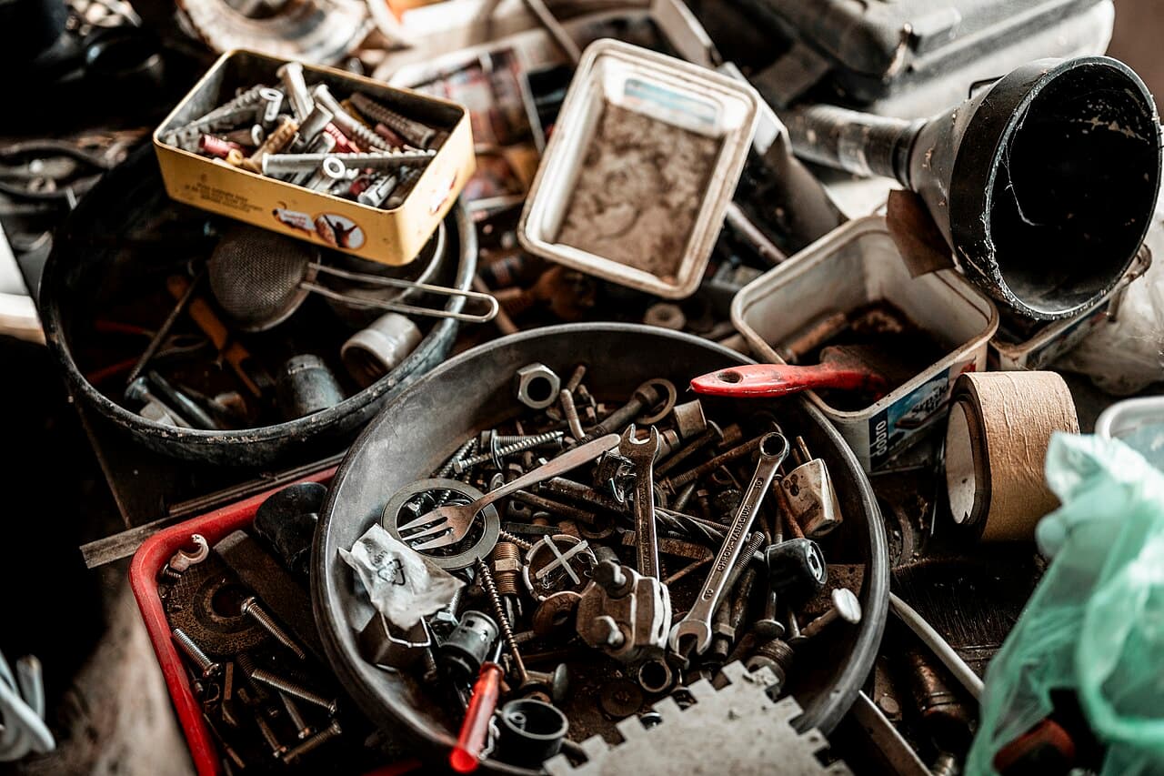 Assorted tools and hardware in a well-stocked workshop